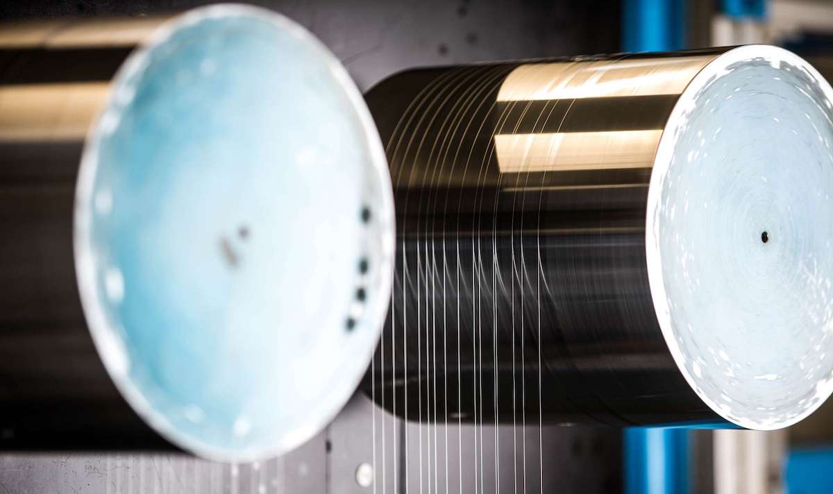 drums spinning new viscose yarn in a Lenzig Facility